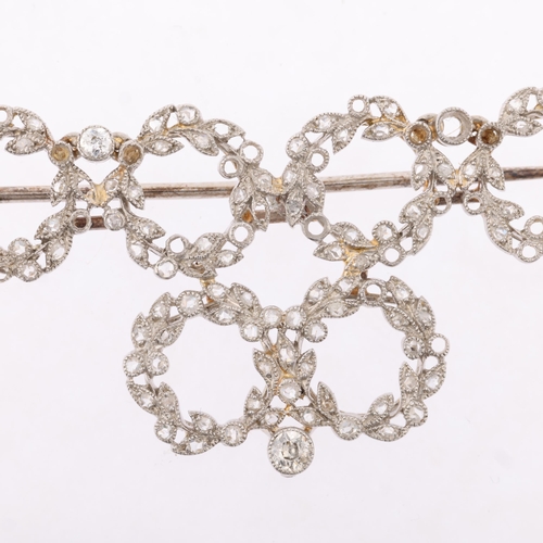 1153 - A Belle Epoque diamond wreath brooch, circa 1910, millegrain set with old European and rose-cut diam... 