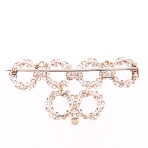 1153 - A Belle Epoque diamond wreath brooch, circa 1910, millegrain set with old European and rose-cut diam... 