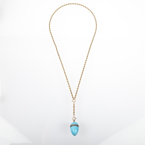 1164 - A Continental blue enamel egg pendant necklace, on 9ct gold rope twist chain, pendant 27.4mm, chain ... 