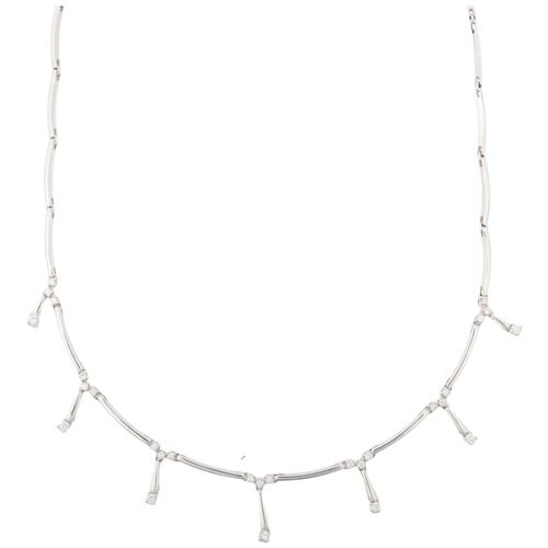 1168 - A modern 18ct white gold diamond fringe necklace, each graduated drop set with modern round brillian... 