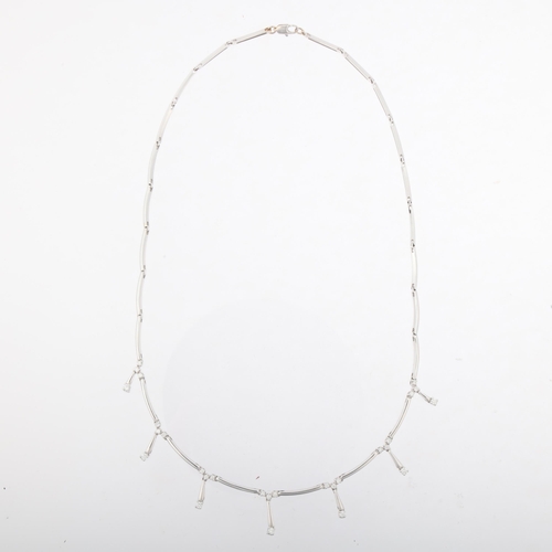 1168 - A modern 18ct white gold diamond fringe necklace, each graduated drop set with modern round brillian... 