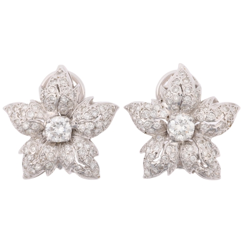 1170 - A pair of 14ct white gold diamond flowerhead cluster earrings, set with modern round brilliant-cut d... 