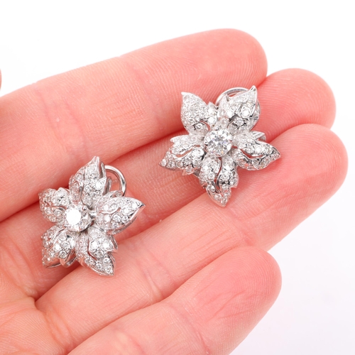 1170 - A pair of 14ct white gold diamond flowerhead cluster earrings, set with modern round brilliant-cut d... 