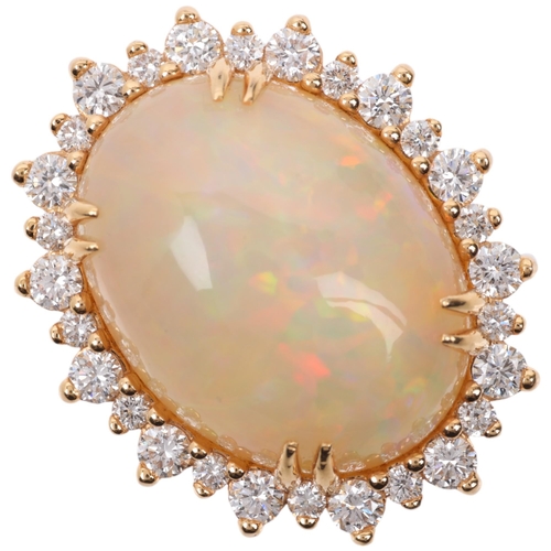 1171 - An impressive 18ct gold Ethiopian opal and diamond oval cluster ring, centrally double claw set with... 