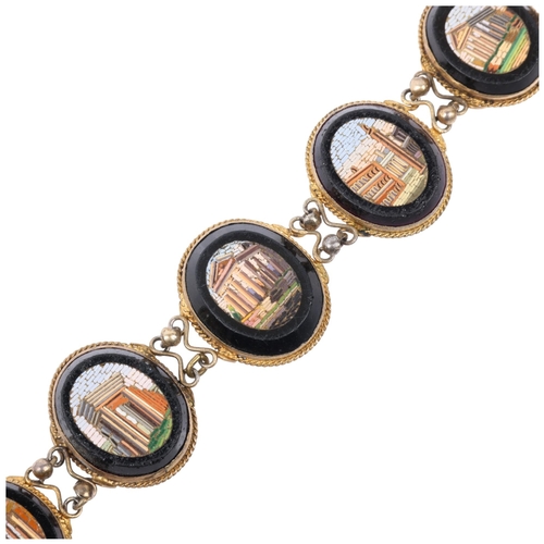 1174 - A 19th century Grand Tour French silver-gilt micro-mosaic 'Greek Ruins' panel bracelet, maker S Frer... 