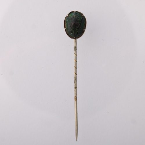 1175 - An Egyptian Revival scarab beetle stickpin, in gilt-metal setting, head 14.1mm, overall 64.9mm, 1.4g