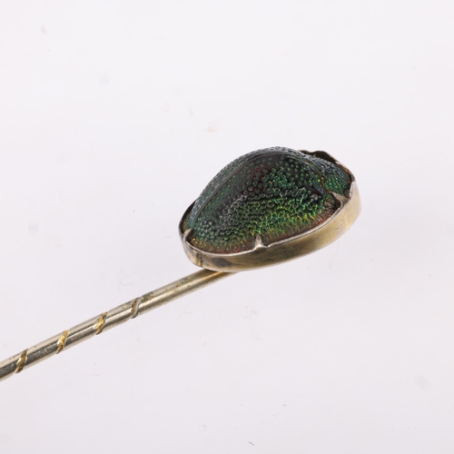 1175 - An Egyptian Revival scarab beetle stickpin, in gilt-metal setting, head 14.1mm, overall 64.9mm, 1.4g