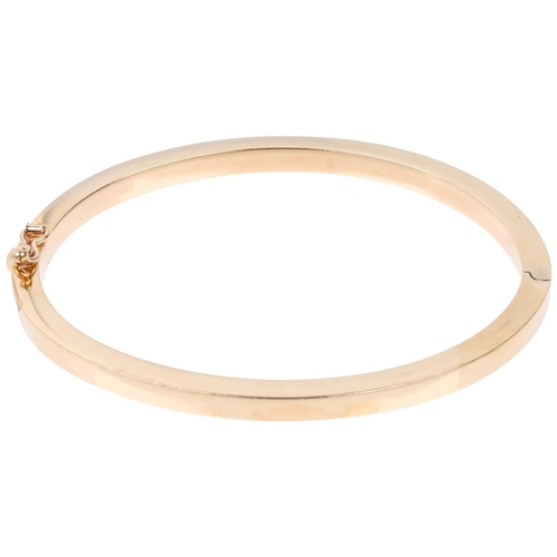 1237 - A 9ct gold plain hinged bangle, band width 4.1mm, internal circumference 18cm, 10.7g