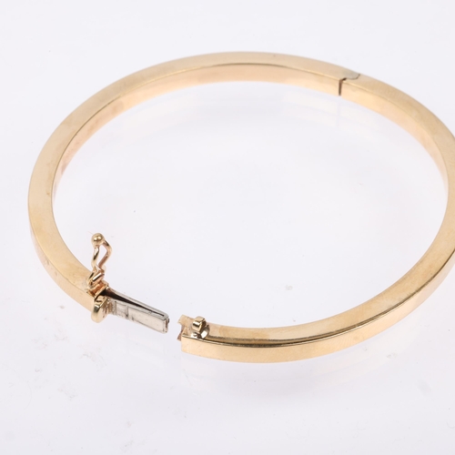 1237 - A 9ct gold plain hinged bangle, band width 4.1mm, internal circumference 18cm, 10.7g