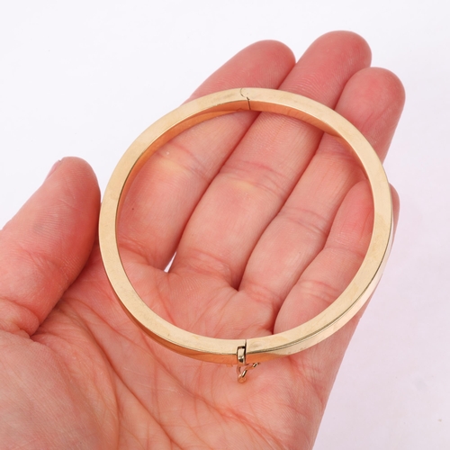 1237 - A 9ct gold plain hinged bangle, band width 4.1mm, internal circumference 18cm, 10.7g