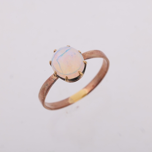 1238 - An early 20th century solitaire opal ring, claw set with 1ct oval cabochon opal, opal measures appro... 