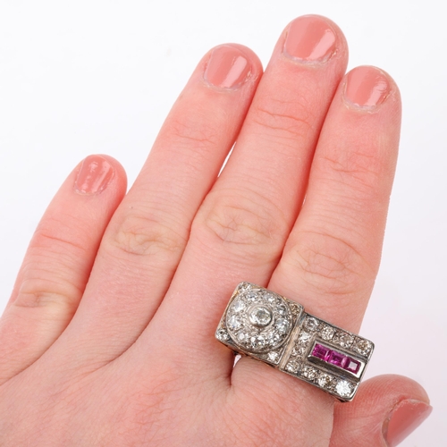 1245 - A large 1950s ruby and diamond tank cocktail ring, set with calibre-cut rubies and old European-cut ... 