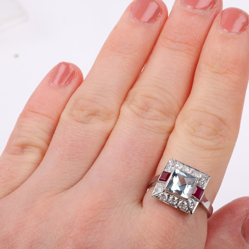 1247 - An Art Deco style platinum aquamarine ruby and diamond square panel ring, set with square-cut rubies... 