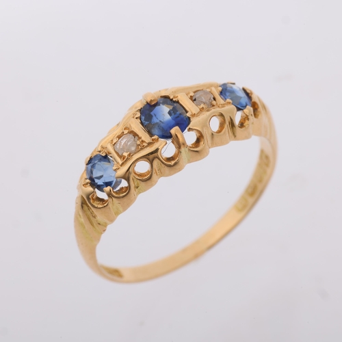 1251 - An early 20th century 18ct gold graduated five stone sapphire and diamond half hoop ring, maker HG&S... 