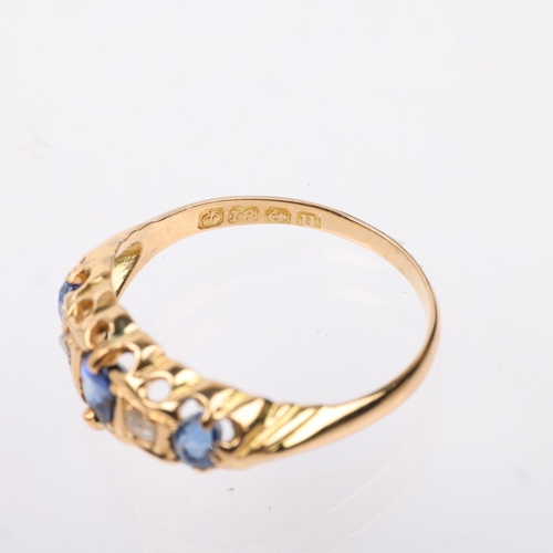 1251 - An early 20th century 18ct gold graduated five stone sapphire and diamond half hoop ring, maker HG&S... 