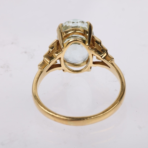 1254 - A late 20th century solitaire aquamarine dress ring, claw set with 4.25ct oval mixed-cut aquamarine,... 