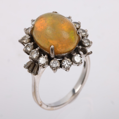 1255 - A 14ct white gold Ethiopian opal and diamond oval cluster ring, claw set with oval cabochon opal and... 