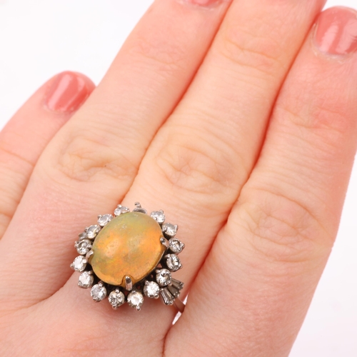 1255 - A 14ct white gold Ethiopian opal and diamond oval cluster ring, claw set with oval cabochon opal and... 