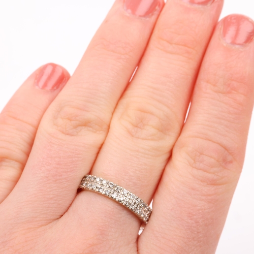 1257 - A modern 18ct white gold diamond double-row full eternity band ring, by Aris, set with modern round ... 