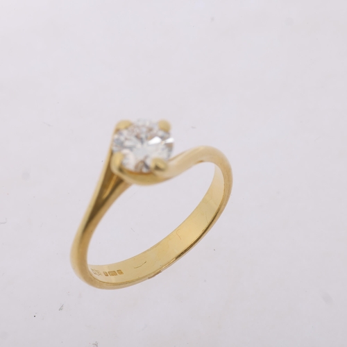 1261 - An 18ct gold 0.6ct solitaire diamond ring, crossover claw set with modern round brilliant-cut diamon... 