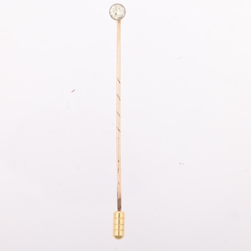 1262 - An early 20th century 0.25ct solitaire diamond stickpin, colour approx L/M, clarity approx I1/I2, ov... 