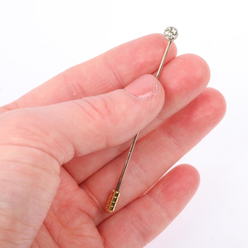 1262 - An early 20th century 0.25ct solitaire diamond stickpin, colour approx L/M, clarity approx I1/I2, ov... 