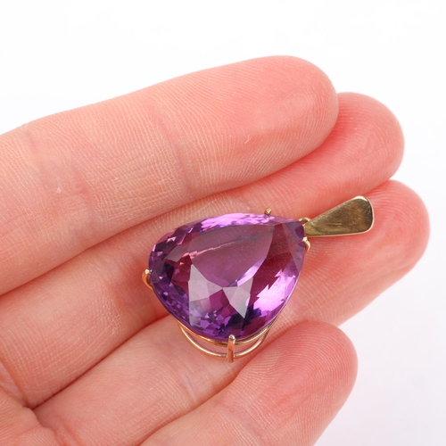 1275 - A 14ct gold amethyst drop pendant, set with 28ct pear-cut amethyst, 33.4mm, 6.8g