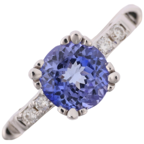 1277 - A modern tanzanite and diamond dress ring, set with round-cut tanzanite and modern round brilliant-c... 