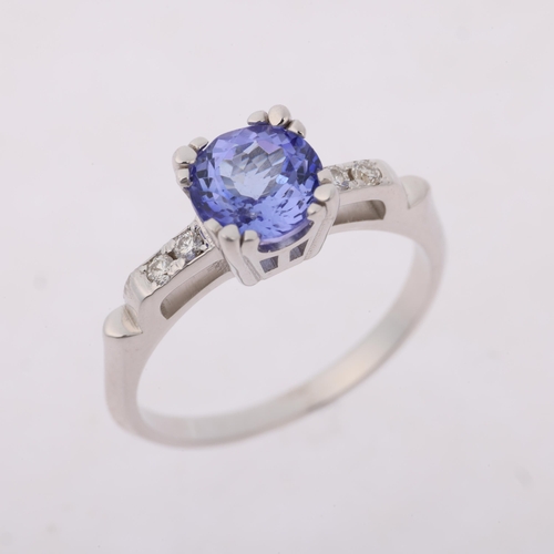 1277 - A modern tanzanite and diamond dress ring, set with round-cut tanzanite and modern round brilliant-c... 