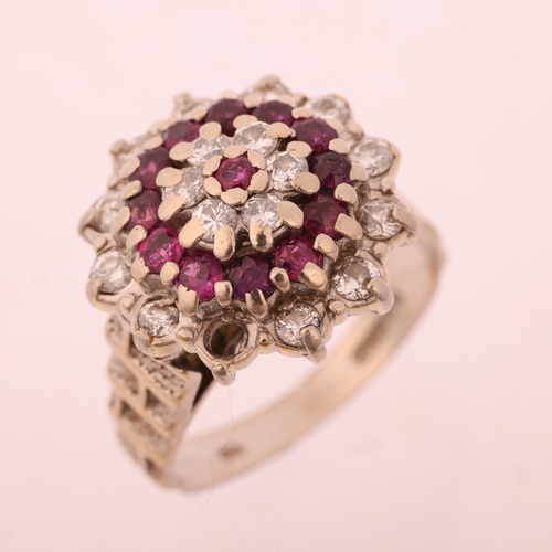 1283 - A late 20th century 18ct white gold ruby and diamond flowerhead cluster ring, maker J Ltd, London 19... 