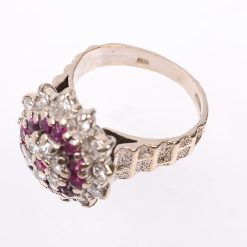 1283 - A late 20th century 18ct white gold ruby and diamond flowerhead cluster ring, maker J Ltd, London 19... 