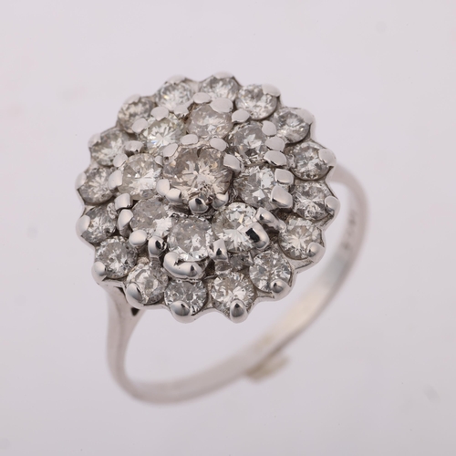 1286 - An 18ct white gold diamond flowerhead cluster ring, total diamond content approx 1.45ct, setting hei... 