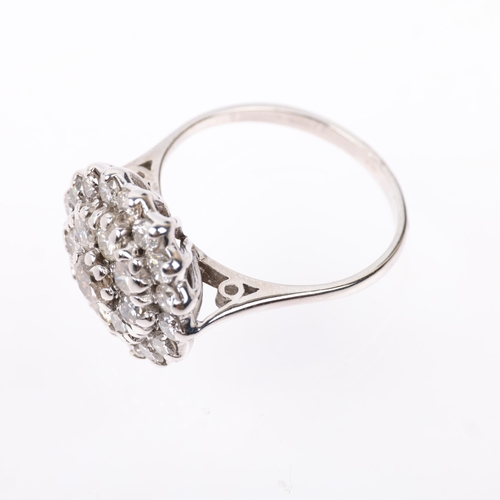 1286 - An 18ct white gold diamond flowerhead cluster ring, total diamond content approx 1.45ct, setting hei... 