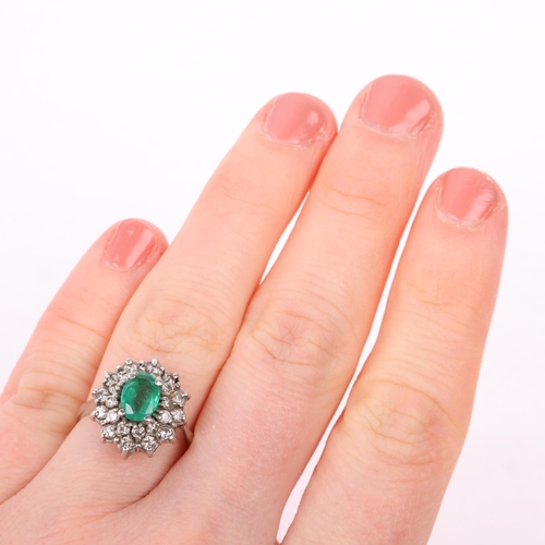 1290 - A Continental 18ct white gold emerald and diamond flowerhead cluster ring, claw set with oval mixed-... 