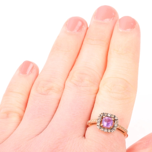 1291 - A modern 9ct rose gold amethyst and diamond halo cluster ring, setting height 9.2mm, size M, 2.2g