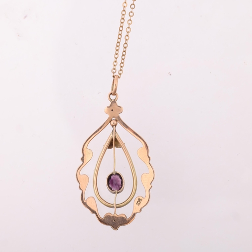 1292 - An Edwardian 9ct rose gold amethyst openwork pendant necklace, on gold filled fine link chain, penda... 