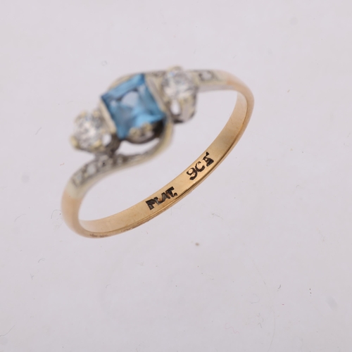 1293 - An Art Deco 9ct gold three stone blue topaz and diamond crossover ring, platinum-topped set with squ... 