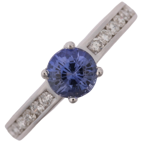 1301 - A modern 18ct white gold tanzanite and diamond ring, set with round-cut tanzanite and modern round b... 