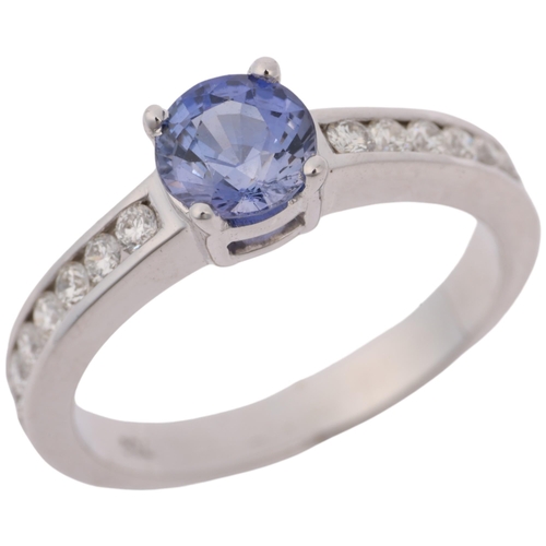 1301 - A modern 18ct white gold tanzanite and diamond ring, set with round-cut tanzanite and modern round b... 