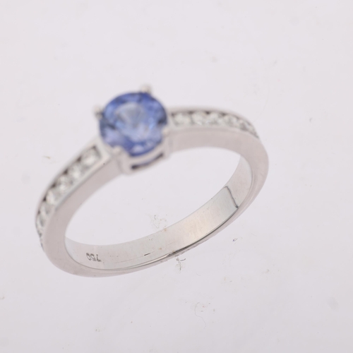 1301 - A modern 18ct white gold tanzanite and diamond ring, set with round-cut tanzanite and modern round b... 