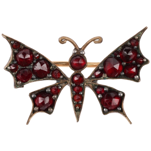 1306 - A Victorian Bohemian garnet figural butterfly brooch, 25.5mm, 2g