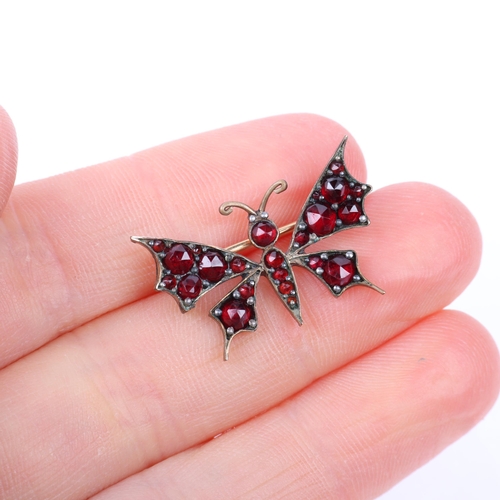 1306 - A Victorian Bohemian garnet figural butterfly brooch, 25.5mm, 2g