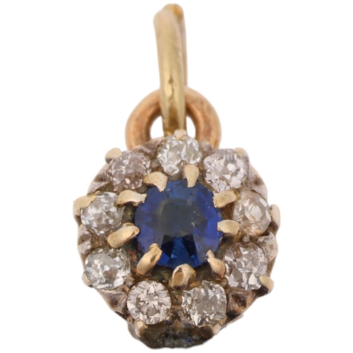 1310 - A large Vintage lapis lazuli sapphire and diamond flowerhead cluster pendant, set with pear cabochon... 