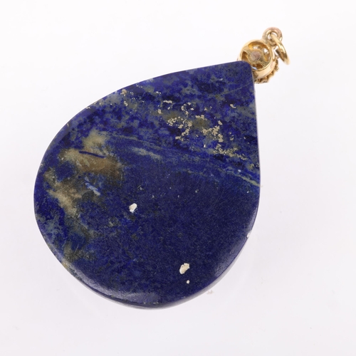 1310 - A large Vintage lapis lazuli sapphire and diamond flowerhead cluster pendant, set with pear cabochon... 