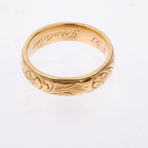 1322 - A late 20th century 18ct gold wedding band ring, maker AM, London 1997, in the Victorian style with ... 