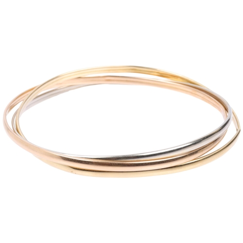 1326 - An Italian 18ct three-colour gold 'Trinity Style' triple bangle, individual band width 3mm, internal... 