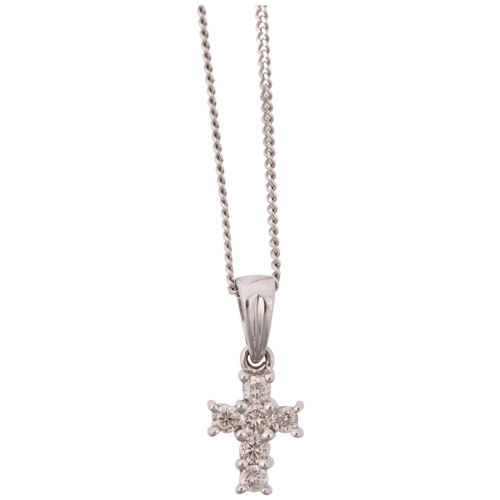 1329 - A modern 9ct white gold diamond cross pendant necklace, on 9ct white gold fine curb link chain, pend... 