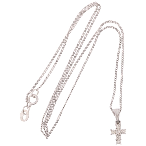 1329 - A modern 9ct white gold diamond cross pendant necklace, on 9ct white gold fine curb link chain, pend... 