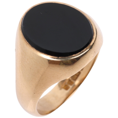 1331 - A late 20th century 9ct gold black onyx signet ring, maker HG&S, Birmingham 1971, panel measures 12.... 