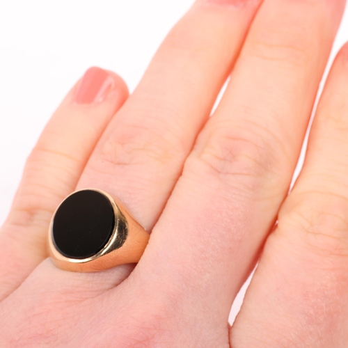 1331 - A late 20th century 9ct gold black onyx signet ring, maker HG&S, Birmingham 1971, panel measures 12.... 